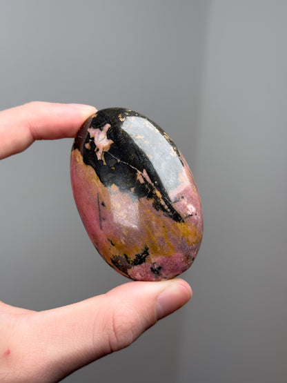 Rhodonite palm stone