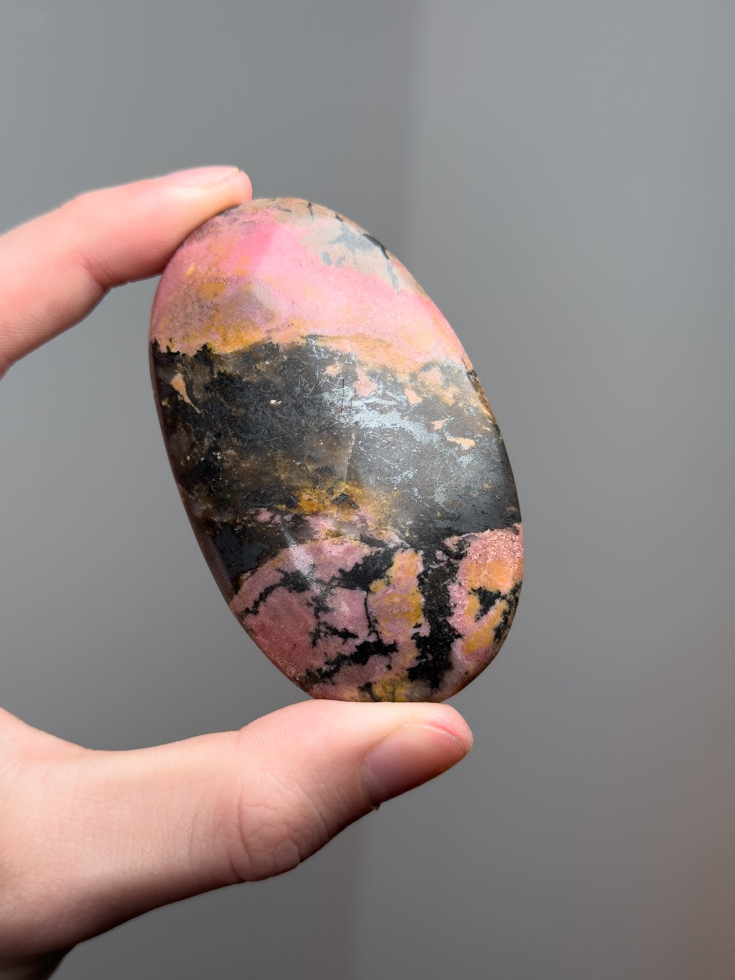 Rhodonite palm stone