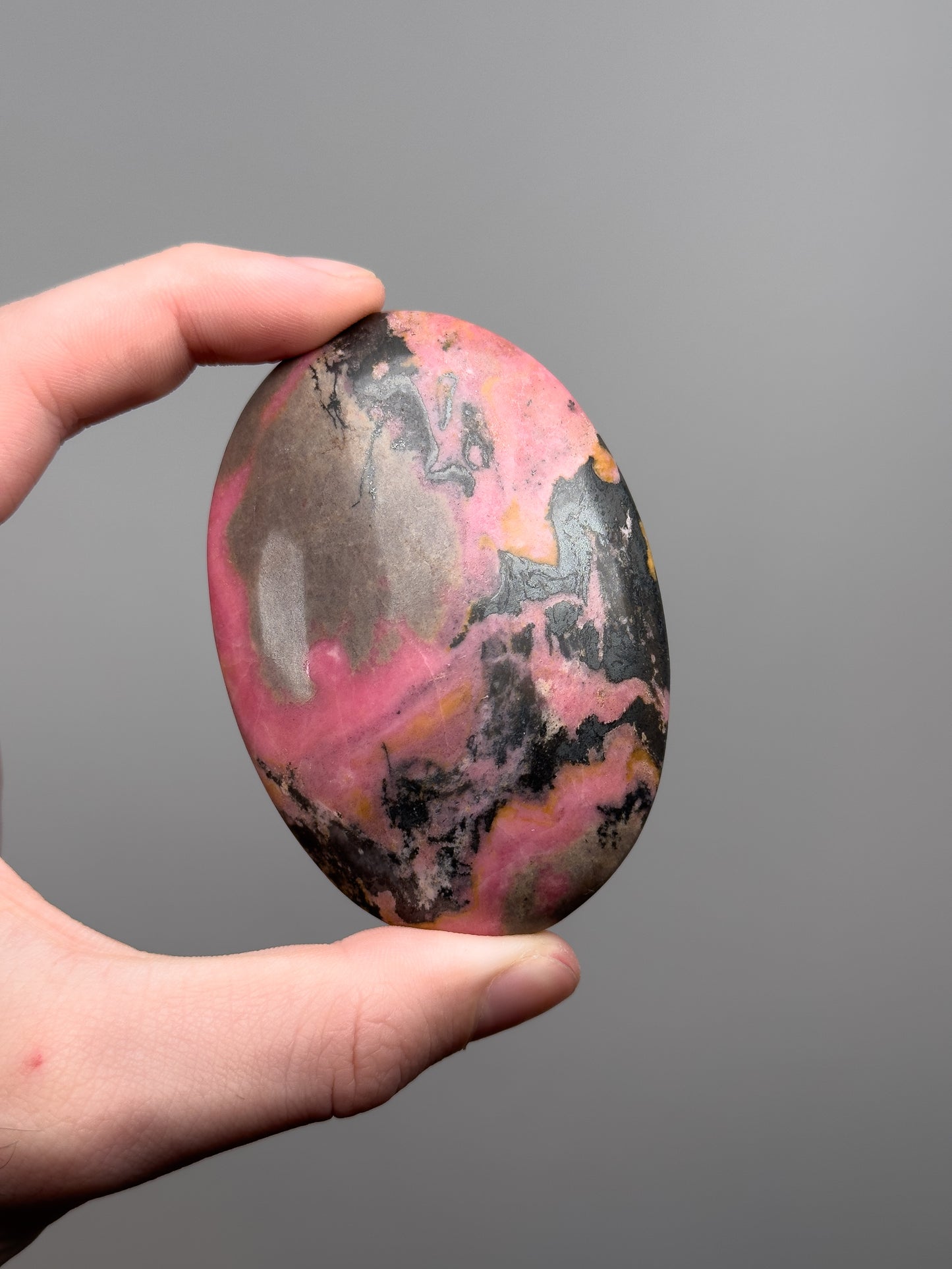 Rhodonite palm stone