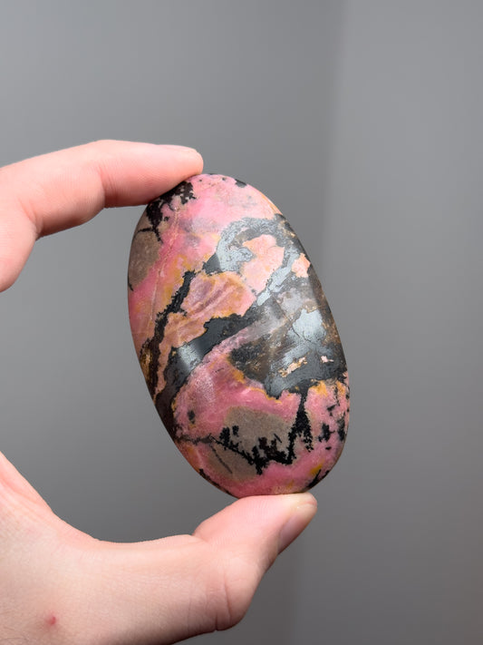 Rhodonite palm stone