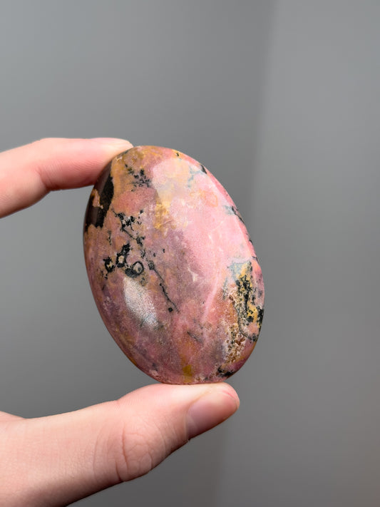 Rhodonite palm stone