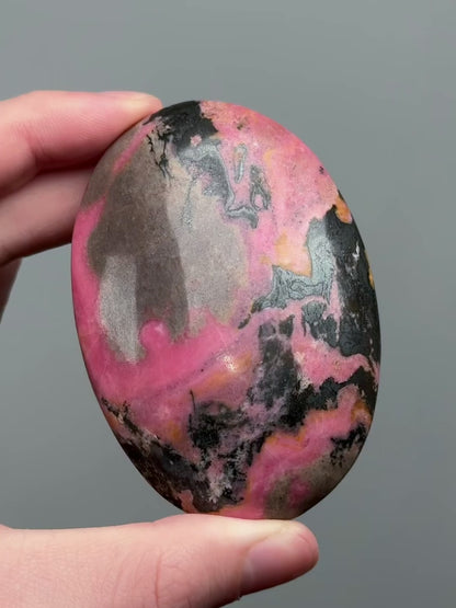 Rhodonite palm stone